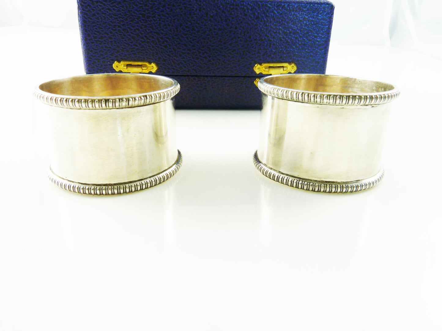 Antique English Sterling Silver Napkin Rings Pair with Gadroon Border Boxed Set - 43 Chesapeake Court Antiques